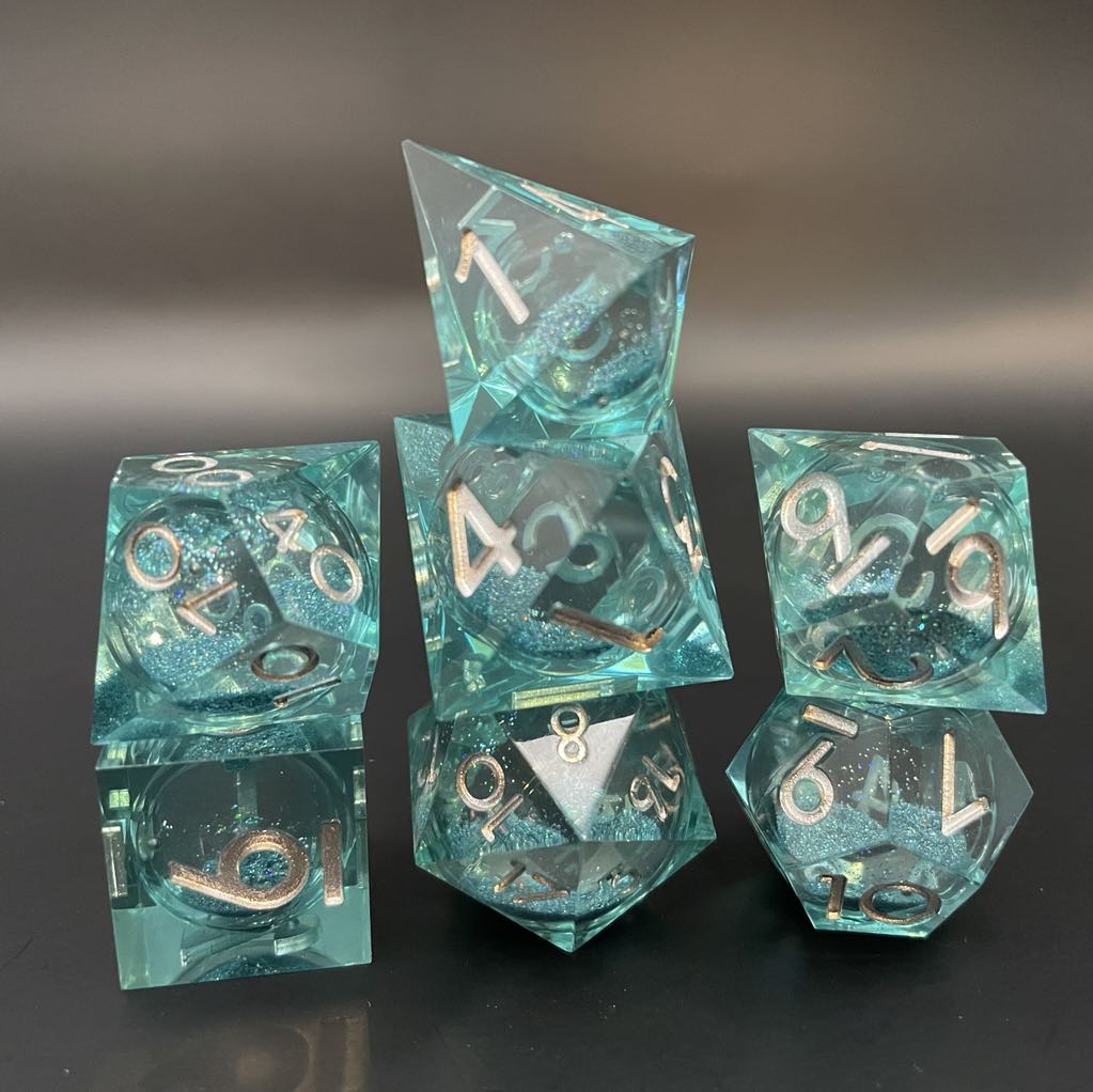 D&D Dice Set Sharp Edge Liquid Core - Topaz Blue (Silver)