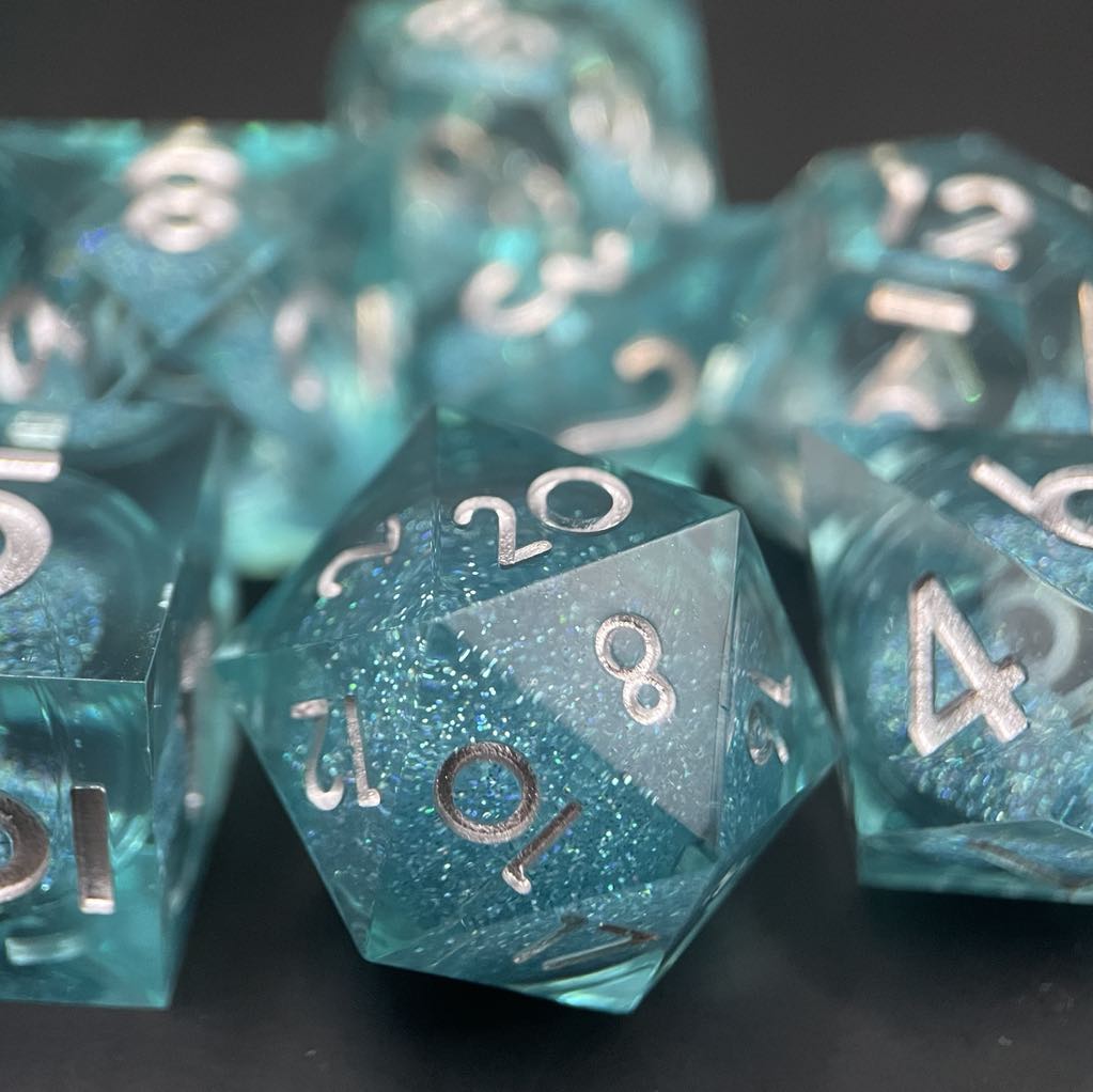 D&D Dice Set Sharp Edge Liquid Core - Topaz Blue (Silver)